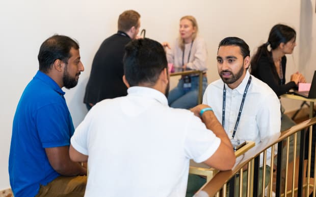 People chatting in startup lounge